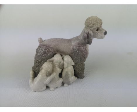 Lladro 'Mother with Pups', Sculptor: Antonio Ballester. Model 01011257, Introduced in 1974 and Retired in 1981. 15cm in heigh