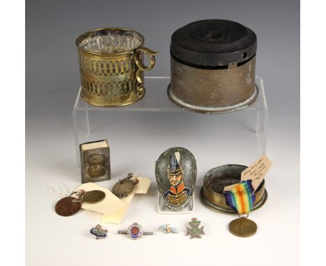 WORLD WAR I INTEREST:  A collection of WW1 memorabilia to include a trench art 1916 4.5" Howitzer shell modelled as a tobacco