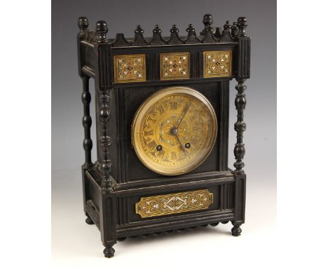 A Lenz Kirch ebonised Aesthetic Movement bracket clock, late 19th century, the castellated case with three inset gilt panels 