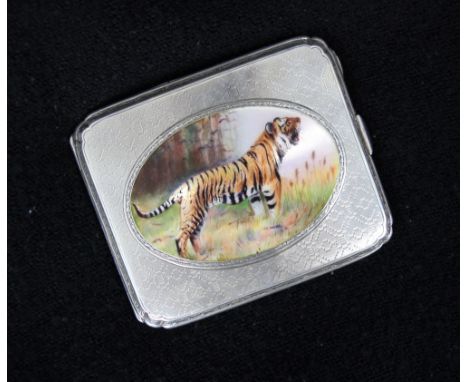 An early 20th century white metal and enamel cigarette case, possibly Austrian/German, the rectangular hinged case with an ov