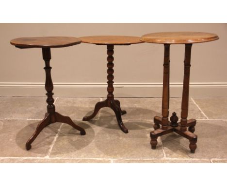 Three 19th century wine/occasional tables, to include an example with a circular moulded top upon four slender ring turned an