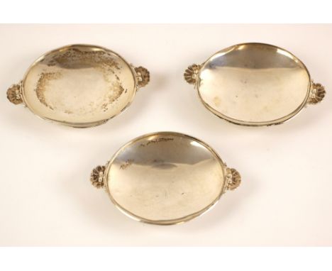 A set of three Georg Jensen trinket dishes, the oval dishes with twin debossed shell handles, stamped to base 'Georg Jensen D