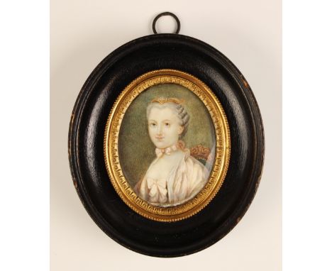 French school (18th century),A half length portrait miniature depicting a seated lady wearing a pink silk dress with bows,Wat