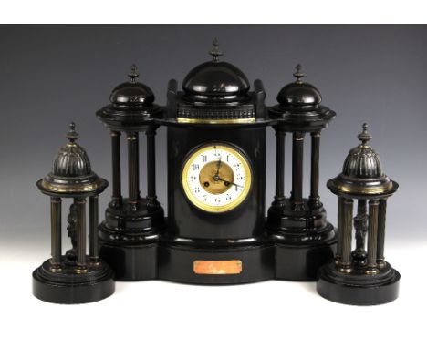 A large Victorian polished slate clock garniture, of architectural portico form, comprising; a mantel clock, with 13cm Arabic