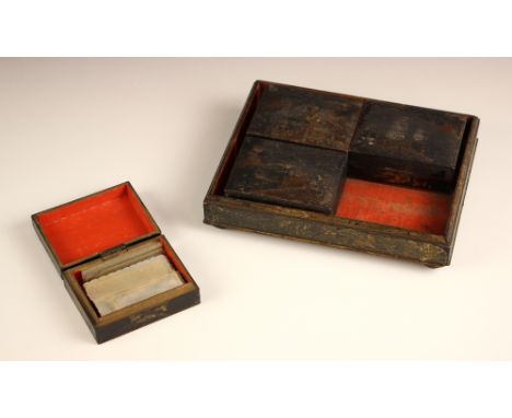 A collection of mother of pearl engraved game tokens, 19th century, of various sizes, within four lacquered hinged boxes, dec