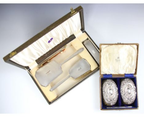 A George VI silver mounted dressing table set, W I Broadway &amp; Co, Birmingham 1939, comprising a hair brush, hand held mir