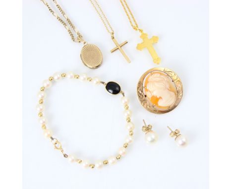 A selection of yellow metal jewellery, including a 9ct fillagree chain suspending oval locket pendant, 28cm long, a yellow me