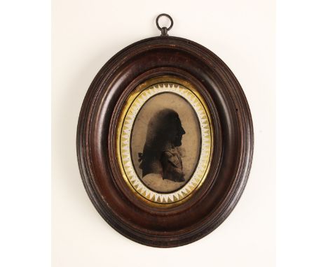 English school (late 18th century),  An oval bust length portrait silhouette in the manner of Isabella Beetham (1753-1825) de