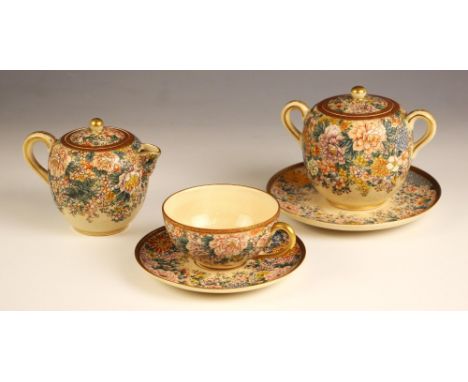 A Japanese Satsuma porcelain part breakfast service, Meiji Period (1868-1912), comprising; a teacup and saucer, a sucrier, co