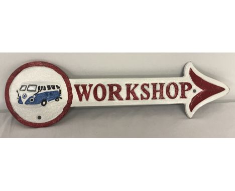 A painted wall hanging workshop arrow, detailed with a VW camper van.  Approx. 41cm long.