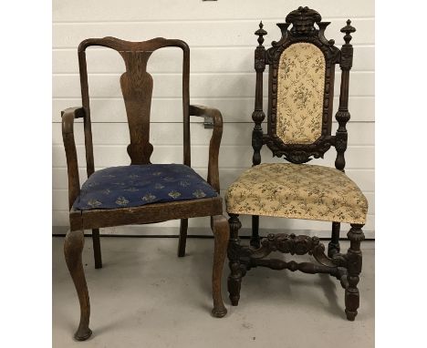 A vintage dark wood hall chair with lion head, floral, scallop shell and carved finial detail. Cream floral upholstery to sea