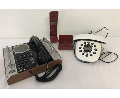 Three vintage/retro telephone handsets. Comprising a Swissvoice L7 in red &amp; white with instructions; a black &amp; white 