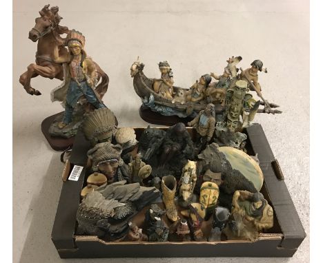 A large quantity of vintage, mostly resin ornaments of Native Americans, in varying sizes.  Largest approx. 45cm tall.