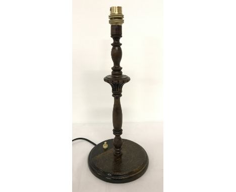 A vintage turned and carved wood table lamp.  Approx. 38cm tall.