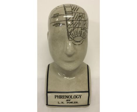 A ceramic L.N. Fowler phrenology head, with crazed glaze effect.  Approx. 24cm tall.
