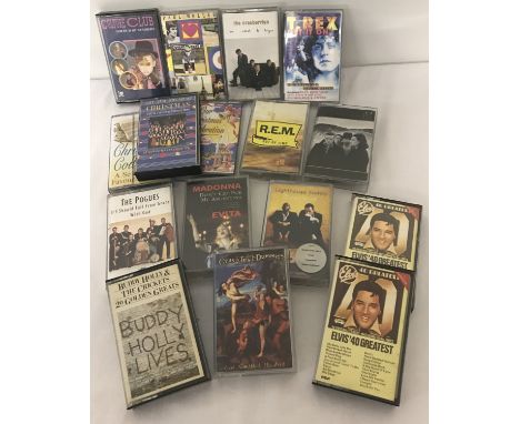 A small collection of vintage cased tapes. To include: U2, Madonna, R.E.M, The Cranberries, T. Rex and Paul Weller. 