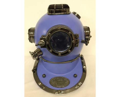 A modern ornamental life size US Navy divers helmet, in pale blue and gunmetal finish. With glass panels. Approx. 43cm tall.
