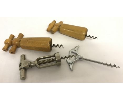 Four vintage corkscrews; two metal and two wooden.  
