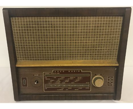 A vintage wooden cased Ekco radio, model U.243.  Approx. 35.5cm tall.