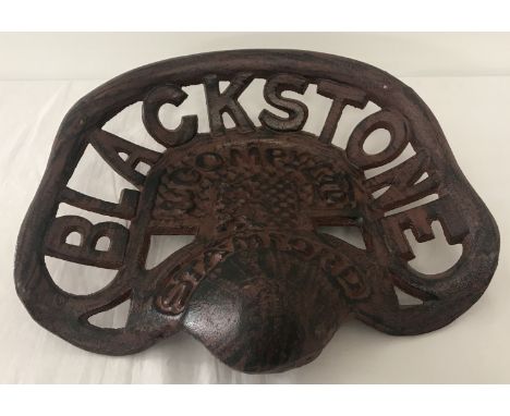 A cast metal Blackstone tractor seat.  Approx. 36.5cm x 34cm.