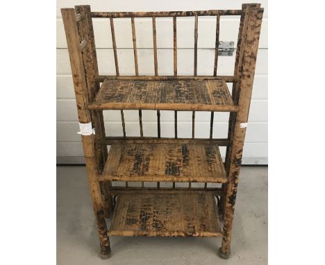 A vintage bamboo 3 shelf bookcase/display shelf.  Approx. 82cm tall.