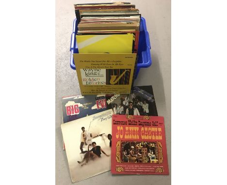 A tub of assorted vintage vinyl records. To include Pop, Swing, Country and Comedy. 