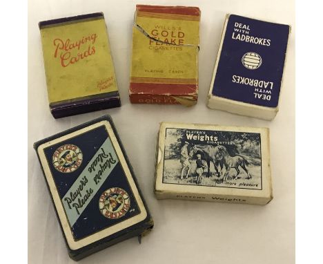 5 packs of vintage playing cards. Comprising: Ladbrokes, Gold flake, Weights, Players (Mexican) and Players Navy Cut. 