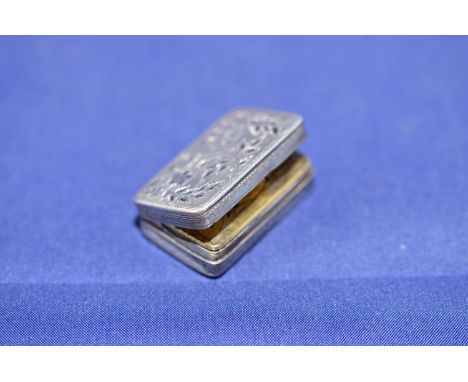 A George III silver vinaigrette, by John Wilkinson, Birmingham 1804, engraved with foliate scrolls, gilt interior with pierce