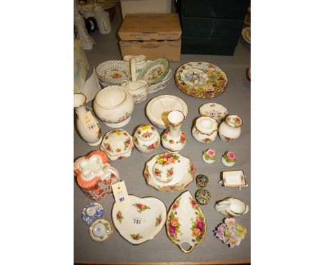 A 19th Century commode shaped teapot; Royal Albert 'Old Country Roses' pattern vases; ginger jar; pin dishes; three Royal Alb