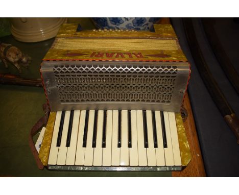 An 'Alvari', Germany accordion, in green case.