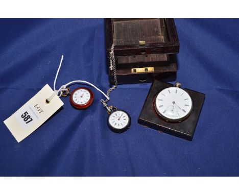 A red enamel cased fob watch, with white enamel arabic dial and seed pearl set shamrock reverse; a silver cased open faced po