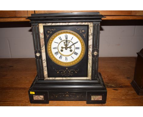 A Victorian black slate and marble visible escapement eight-day chiming mantel clock, enamel roman dial.