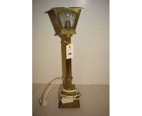 An early 20th Century brass table lamp in the form of a street light.