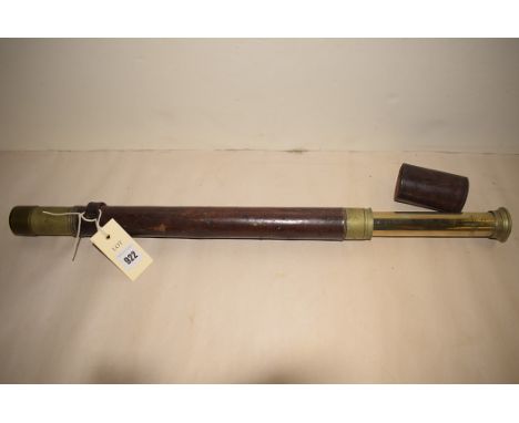 An early 20th Century brass single drawer military telescope, by T. Cooke & Sons Limited, London & York, number 67, with broa