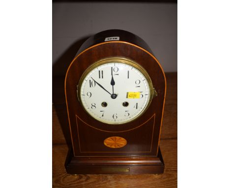 An Edwardian inlaid mahogany mantel clock, enamel arabic dial, with French striking movement, with inlaid mahogany brass pres