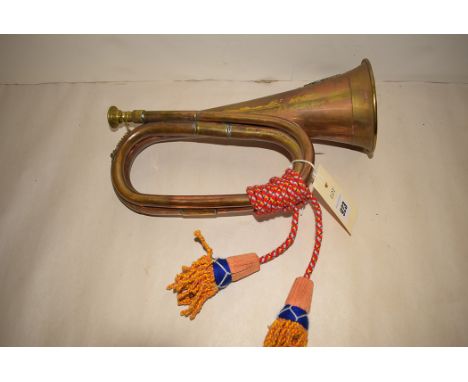 A brass and copper bugle for the Ontario regiment, with tassle.