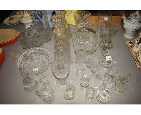 A pair of Victorian cut glass decanters; another decanter; cut glass bowls; vases; drinking glasses; and other glassware.