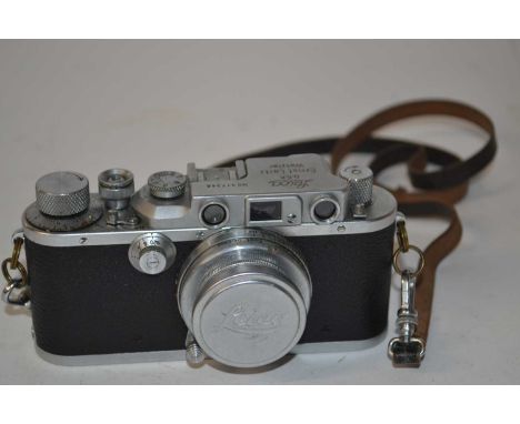 Camera and Photography Interest - A Leica IIIB 1939 NO317348 with Summar 5cm lens, Elmar 9cm lens, filters, film cannisters e