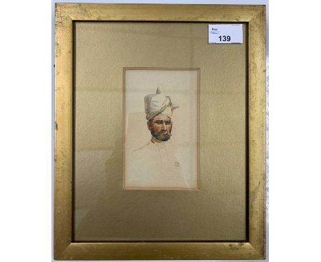 Indian School, 20th century, Bust portrait of an Indian gentleman, watercolour, initialed VG, 8x13cm, framed and glazed