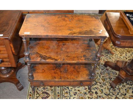 A Victorian walnut veneered three tier shelf or what not with base drawer, 68cm wideOverall very dirty. Needs restoring throu