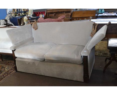 A good quality Knowle style sofa finished in mushroom upholstery with carved front pillars, 160cm wide