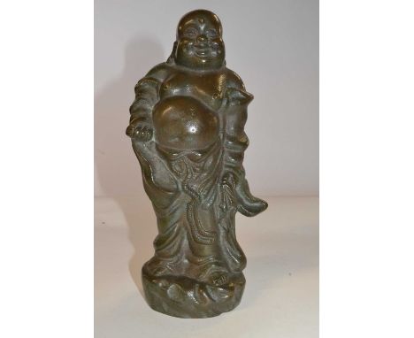 A Chinese bronze figure of an immortal, 24cm high