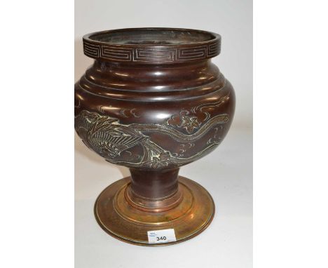 A Japanese bronze vase and stand with raised decoration of flowers and dragons, Meiji period, 30cm high