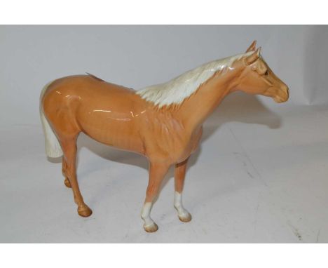 A Beswick model of a Palomino mare in a gloss finish by Arthur Gredington (1961-1983)