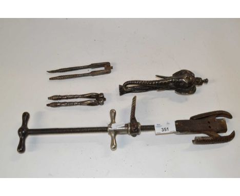 Group lot of metal wares comprising a sole makers tool together with a novelty elephant head nut cracker and two further pair