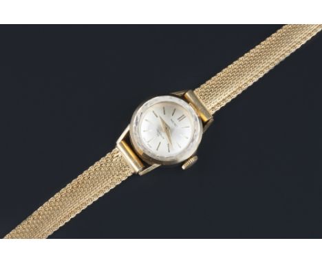 A lady's wristwatch by Heno, the circular signed silvered dial with baton markers, to manual jewelled movement and tapered br