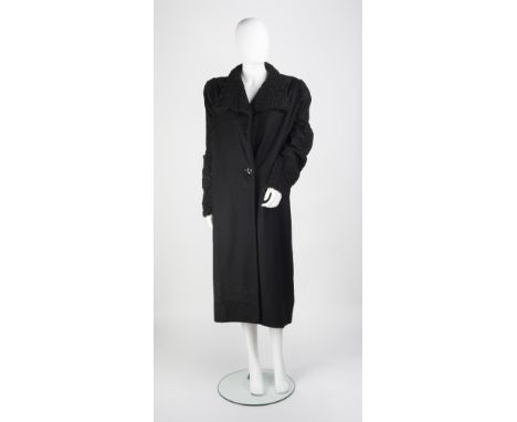 A 1940s Lanvin black evening coat, with astrakhan collar, lapels and cuffs, single button fastening to front, Jeanne Lanvin P