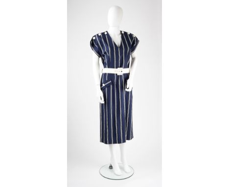 A Pierre Balmain navy and white striped shift dress, circa 1985, with button detail to shoulders, pockets with button detail 