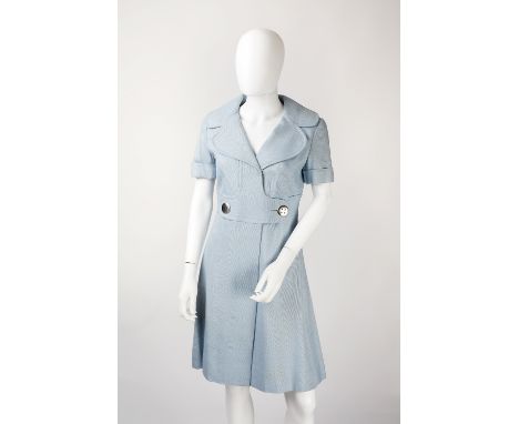 A 1970s pale blue coat dress, with collar, large button detail to waist and short sleeves, Nam-Reebi label to neck, and a yel