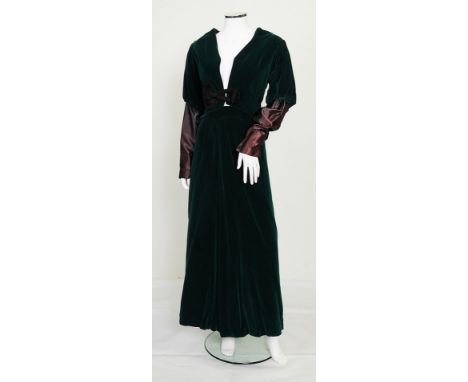 A 1960s/1970s theatrical Edwardian style costume in dark green velvet, consisting of a full length skirt with jacket, the jac